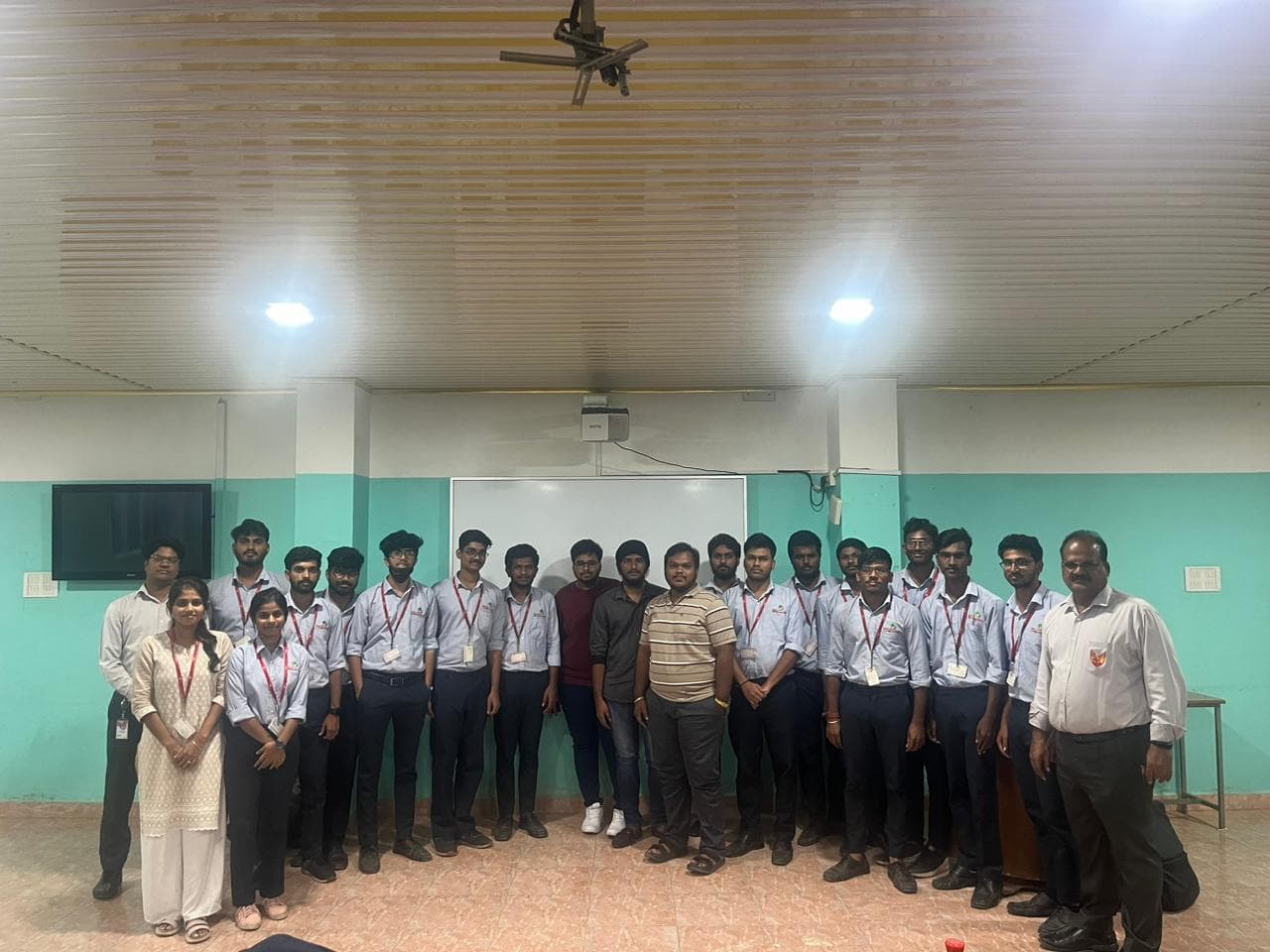 Sraventix trainers and students posing together after a classroom training session