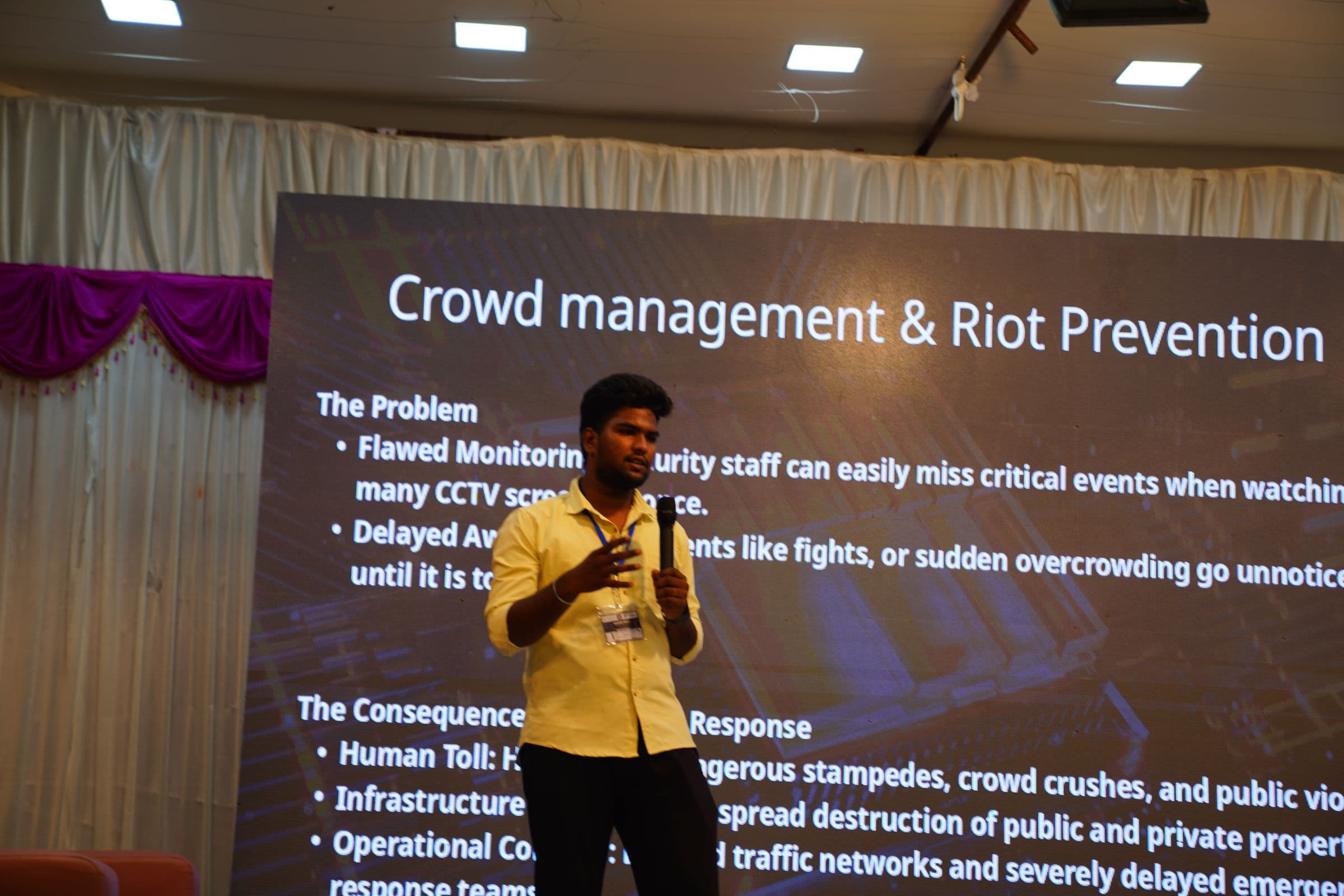 A participant pitching a crowd management and riot prevention solution to the audience